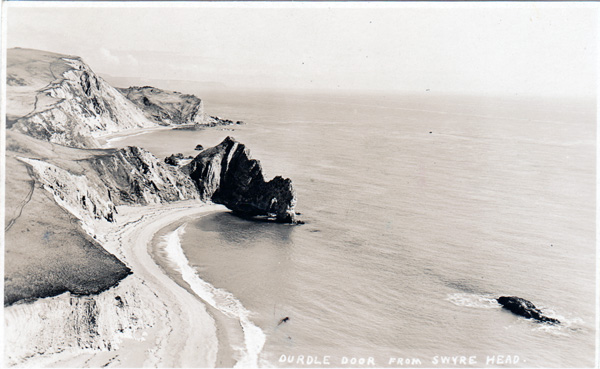 black and white postcard with a view of Durdle Door
